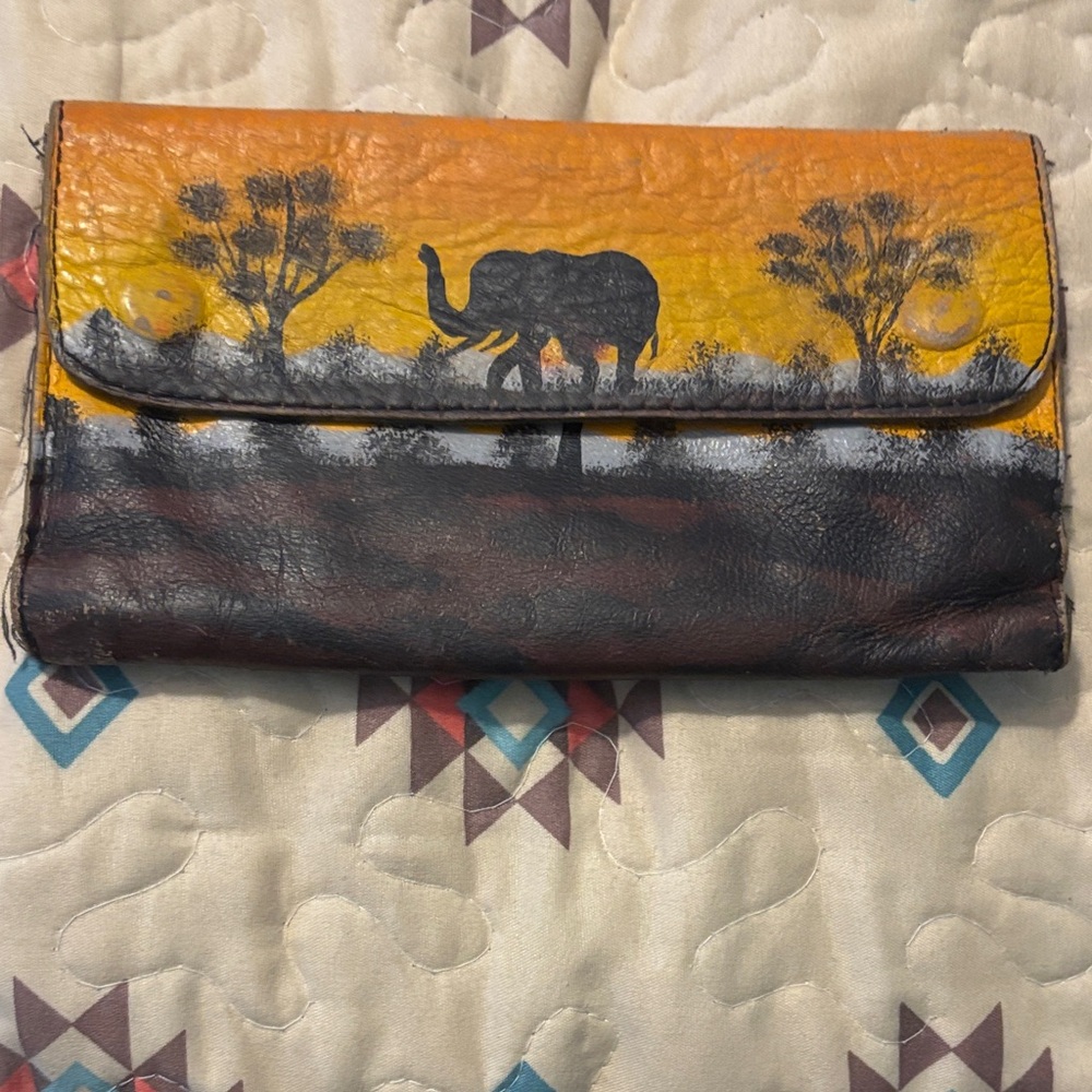 Elephant Design Leather Clutch